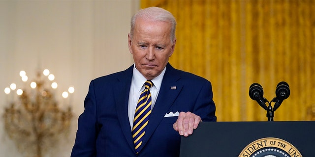 President Biden listens to a question during a news conference in the East Room of the White House in Washington, Jan. 19, 2022. 