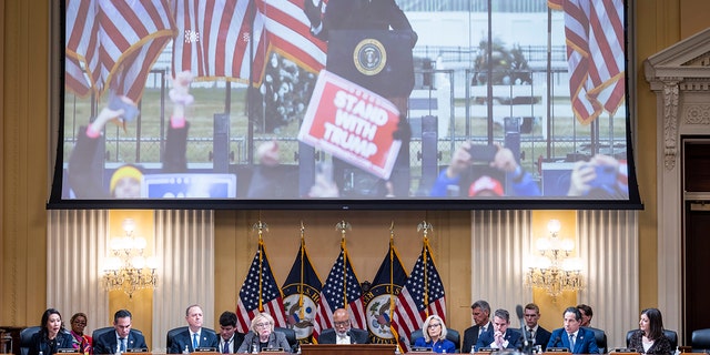 An image of former President Donald Trump is displayed as members of the House Select Committee to Investigate the January 6 Attack on the U.S. Capitol in the Canon House Office Building on Capitol Hill on December 19, 2022, in Washington, DC. 