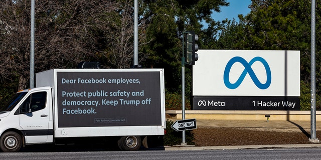 A mobile billboard, deployed by Accountable Tech, is seen outside the Meta Headquarter on January 17, 2023, in Menlo Park, California. 