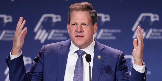 New Hampshire Gov. Chris Sununu speaks at an annual leadership meeting of the Republican Jewish Coalition on Nov. 19, 2022, in Las Vegas.