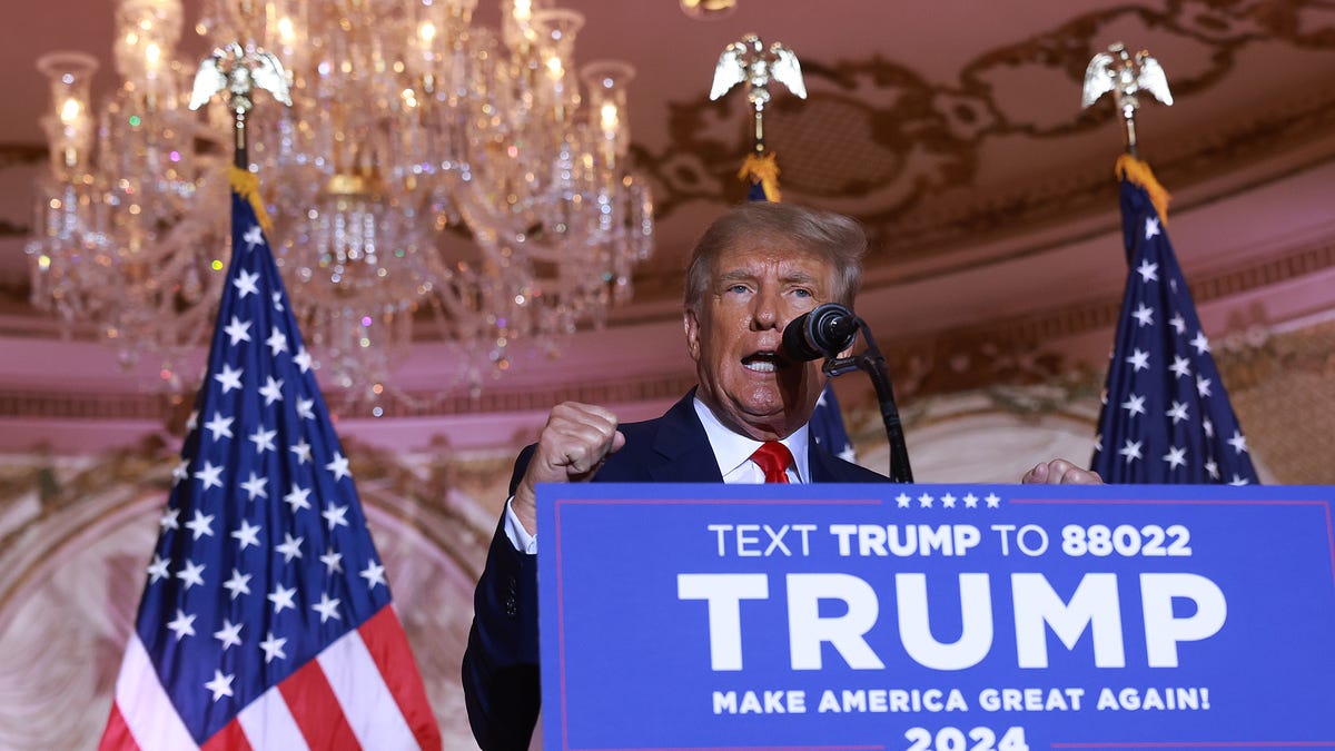 Donald Trump speaking at a podium