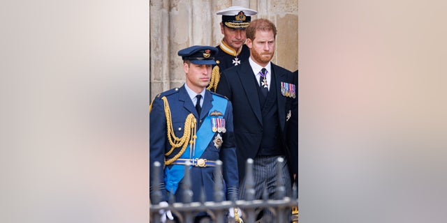 Prince William, Prince of Wales and Prince Harry, Duke of Sussex during the State Funeral of Queen Elizabeth II at Westminster Abbey. 