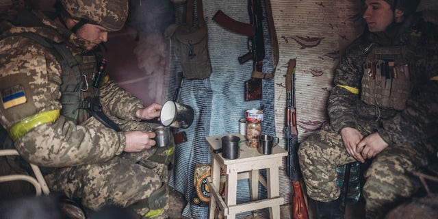 BAKHMUT, UKRAINE - DECEMBER 31: Ukrainian soldiers are seen in a trench on New Year's Eve in Bakhmut, Ukraine on December 31, 2022. 