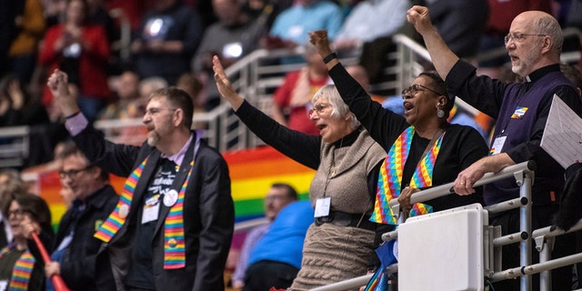 Protesters chant during the United Methodist Church's special session of the general conference in St. Louis, Missouri, on Feb. 26, 2019. 