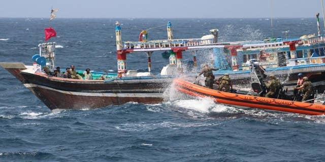 U.S. Coast Guard cutter Glen Harris personnel interdict a fishing vessel smuggling drugs in the Gulf of Oman on Aug. 30, 2022. 
