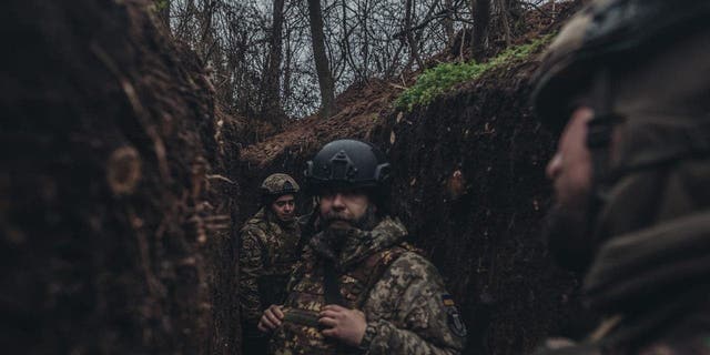 Ukrainian soldiers in a trench on the Vuhledar frontline in Donetsk oblast, Jan. 5, 2023. 