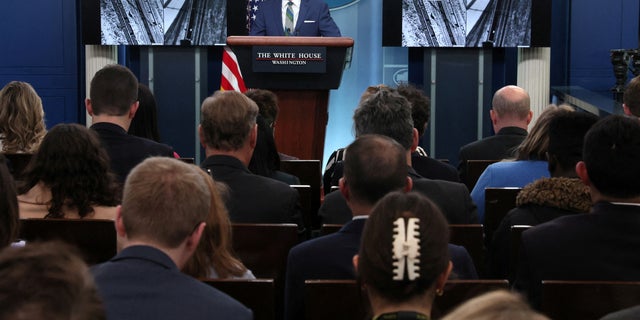 White House National Security Council Strategic Communications Coordinator John Kirby presents images that allege railcar movement between Russia and North Korea, during a press briefing at the White House in Washington, U.S., January 20, 2023. 