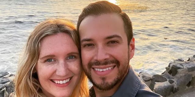 California public defender, Elliot Blair, and his wife, Kim, smile in photo from GoFundMe page. 