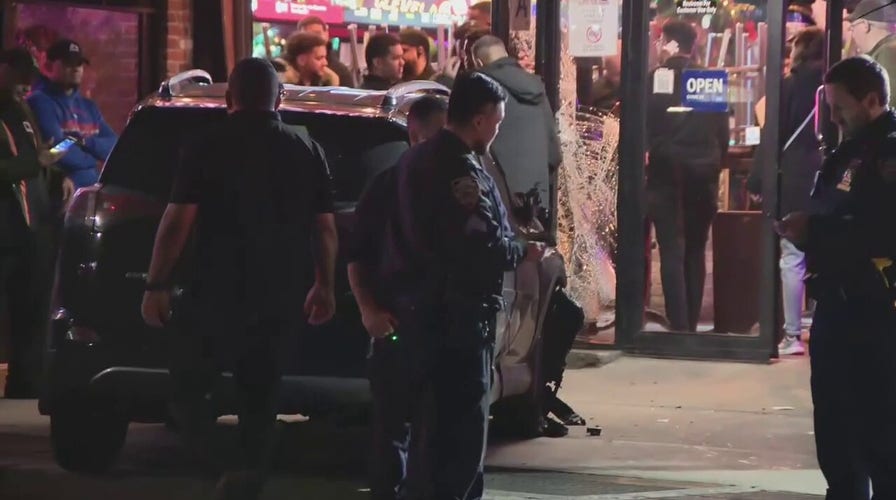 Vehicle crashes into Manhattan restaurant