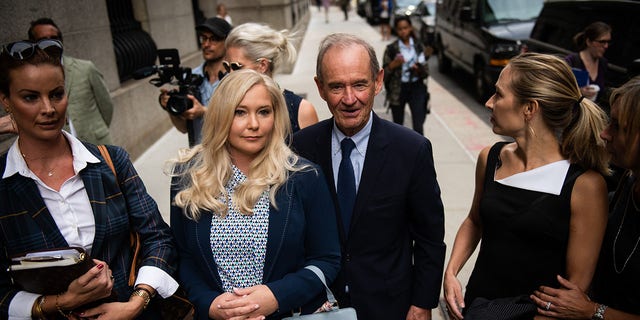 David Boies, representing several of Jeffrey Epstein's alleged victims, center, arrives with Annie Farmer, second right, and Virginia Giuffre, alleged victims of Jeffrey Epstein, second left, at federal court in New York, U.S., on Tuesday, Aug. 27, 2019. 