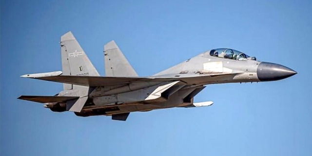 In this undated file photo, a Chinese PLA J-16 fighter jet flies in an undisclosed location.