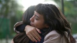 Sympathetic woman hugging friend with EMPATHY and SUPPORT. Friendship concept between two best friends