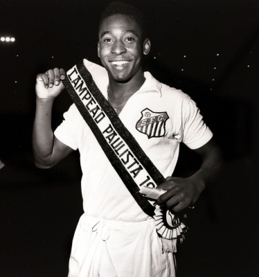 Pelé wears a sash after Santos became São Paulo state champions in 1961. Pelé played for the club from 1956-1974, scoring 618 goals and winning six Brazilian league titles. In 1962 and 1963, Santos won the Copa Libertadores, which is South America's premier club competition.