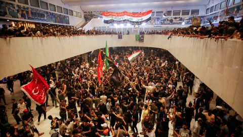 Supporters of populist leader Moqtada al-Sadr gather during a sit-in at Iraq's parliament in Baghdad on July 31. 