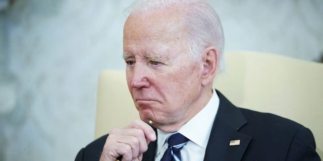 President Biden listens to Japanese Prime Minister Fumio Kishida speak in the Oval Office of the White House in Washington, D.C., on Jan. 13, 2023.