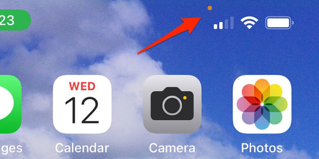 When an orange dot appears in the top-right corner of your screen – right above your cellular bars – it means an app is using your iPhone's microphone.