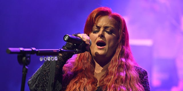 Wynonna Judd said touring after her mother's death was healing for her. 