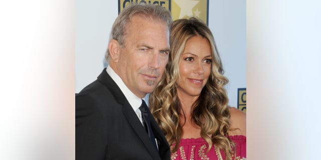 Kevin Costner and Christine Baumgartner arrive at the Critics' Choice Television Awards on June 18, 2012 in Beverly Hills, California.