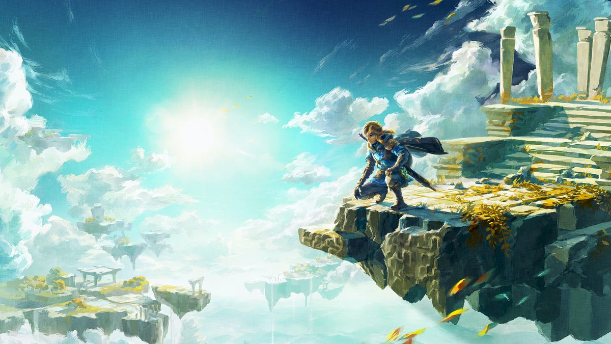 Link looks out at floating islands in the sky in the Zelda: Tears of the Kingdom key art.