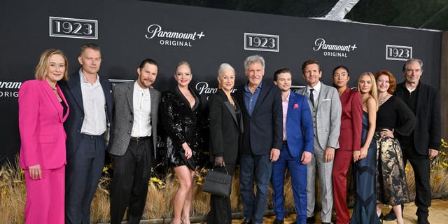 From left, Jennifer Ehle, James Badge Dale, Brian Geraghty, Marley Shelton, Helen Mirren, Harrison Ford, Darren Mann, Sebastian Roché, Aminah Nieves, Michelle Randolph, Kerry O'Malley and Timothy Dalton attend the Los Angeles premiere of "1923."