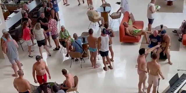 Guests gather in the hotel lobby after reported shooting at Hyatt Ziva Riviera Cancun resort, in Cancun, Quintana Roo, Mexico November 4, 2021, in this still image obtained from a social media video.