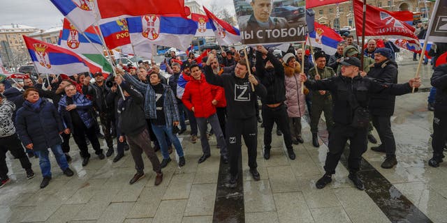 A group of citizens gathers in front of the U.S. Embassy in Moscow, the capital of Russia, protested with the flags of Russia and Serbia, on April 3, 2022. 