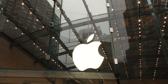 An Apple logo hangs inside their retail store on Broadway on Jan. 10, 2023, in New York City. 