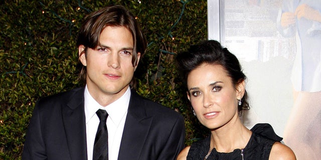 Ashton Kutcher, left, and Demi Moore were married for eight years, and he was stepdad to her three daughters. They are pictured here in 2011.