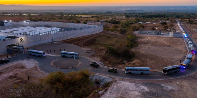 A general view shows a convoy in which 2,000 gang members were transferred to the Terrorism Confinement Center, according to El Salvador's President Nayib Bukele, in Tecoluca, El Salvador, in this handout distributed to Reuters on February 24, 2023. 