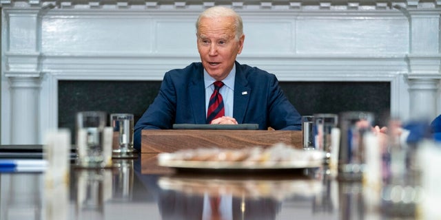 President Joe Biden speaks during a meeting with Democratic lawmakers in the Roosevelt Room of the White House. During the meeting, Biden touched on the economy and other issues. 