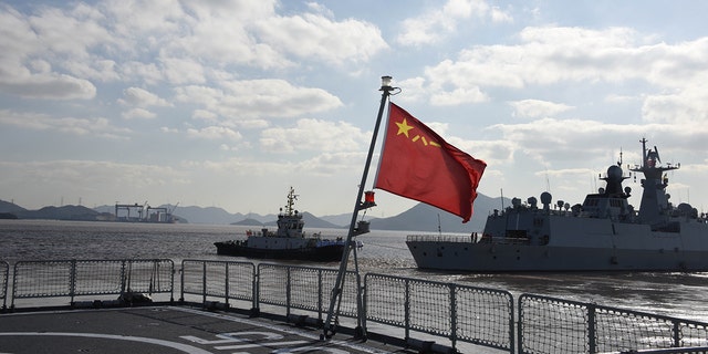 A Chinese navy fleet departs for an upcoming China-Russia joint naval exercise from a military port in Zhoushan, east China's Zhejiang Province, Dec. 20, 2022. 