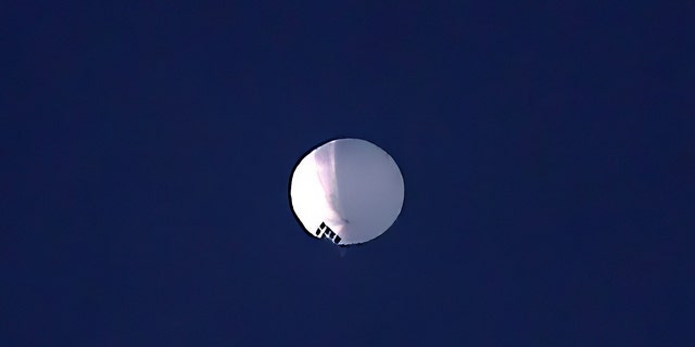A high altitude balloon floats over Billings, Mont., on Wednesday, Feb. 1, 2023. 