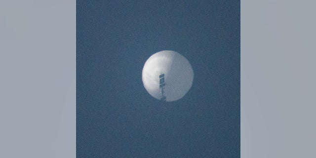 A balloon flies in the sky over Billings, Montana, Feb. 1, 2023, in this picture obtained from social media. 