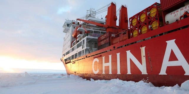 China's research icebreaker Xuelong arrives at the roadstead off the Zhongshan station in Antarctica, Dec. 1, 2018. The research team has carried out unloading work by using a helicopter. 