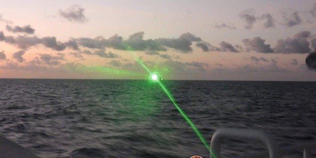 A China coast guard vessel's use of a military-grade laser light temporarily blinded some crew members aboard the Philippine coast guard vessel.