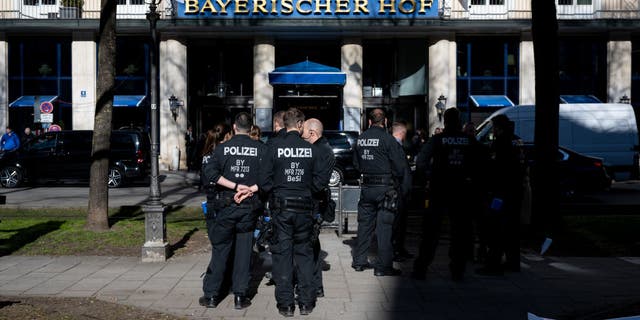 Police officers stand in front of the Hotel Bayerischer Hof, where the 59th Munich Security Conference will be held from Feb. 17 to 19, 2023. 