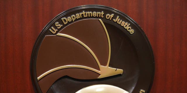 The seal of the Drug Enforcement Administration is seen on a lectern before the start of a press conference at DEA headquarters on June 26, 2013, in Arlington, Virginia.