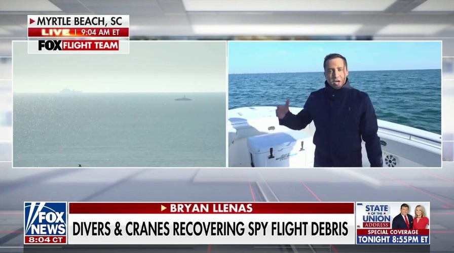 Divers, cranes recovering spy flight debris off South Carolina coast