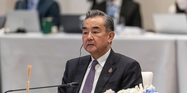 Wang Yi, China's foreign minister, is pictured at the Asia-Pacific Economic Cooperation leaders informal dialogue in Bangkok, Thailand, on Nov. 18, 2022. Yi met with French President Emmanuel Macron on Wednesday to start off his trip to Europe.