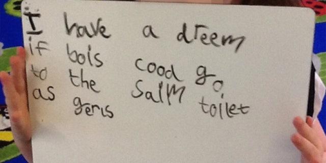 A photo reportedly from the website of Heavers Farm Primary School shows a young student expressing a desire that boys and girls can use the same restroom.