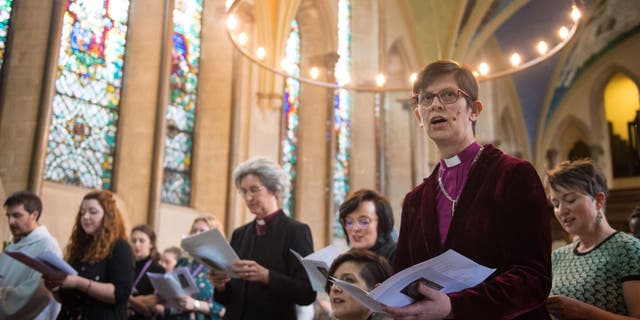 Bishop of Derby Right Rev. Libby Lane, second right, sings at a service of celebration to mark the 25th anniversary of the ordination of women in the Church of England, at Lambeth Palace, London.