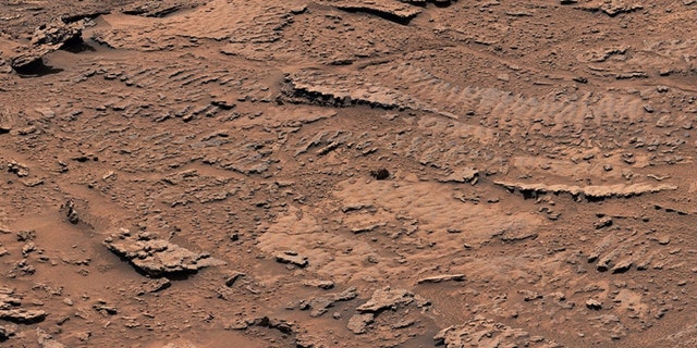 Billions of years ago, waves on the surface of a shallow lake stirred up sediment at the lake bottom. Over time, the sediment formed into rocks with rippled textures that are the clearest evidence of waves and water that NASA’s Curiosity Mars rover has ever found.