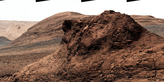 At the bottom of this valley, called Gediz Vallis, is a mound of boulders and debris that are believed to have been swept there by wet landslides billions of years ago. The rover team hopes to get a closer look at this evidence for flowing water, which is likely the youngest that Curiosity will ever find.