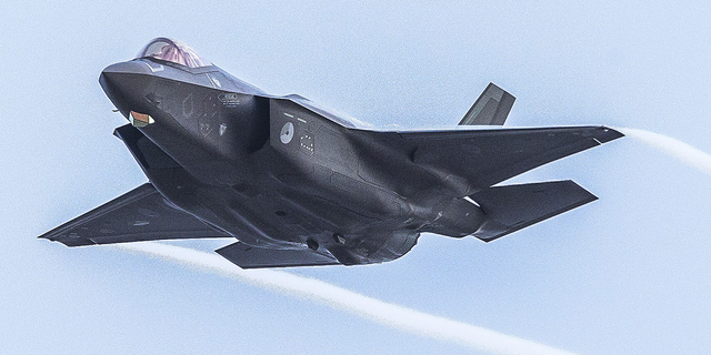 An F-35 military aircraft of the Royal Netherlands Air Force trains on targets at the NATO training location at the Vliehors Range on Vlieland.