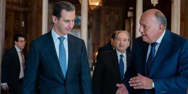 Syrian President Bashar Assad, left, meets with Egyptian Foreign Minister Sameh Shoukry in Damascus, Syria, on Feb. 27, 2023.