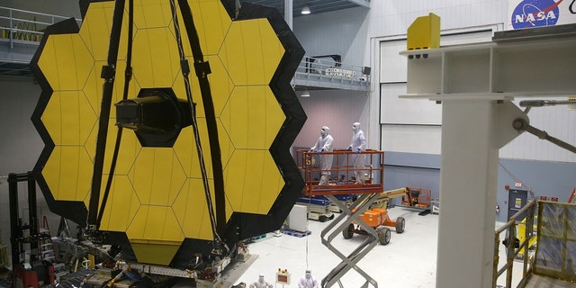GREENBELT, MD - NOVEMBER 02: Engineers and technicians assemble the James Webb Space Telescope November 2, 2016, at NASA's Goddard Space Flight Center in Greenbelt, Maryland. 