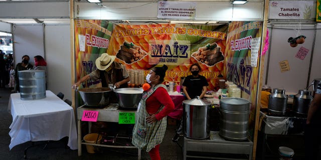 Vendors at a Mexican festival await customers as inflation in the Central American nation surges.
