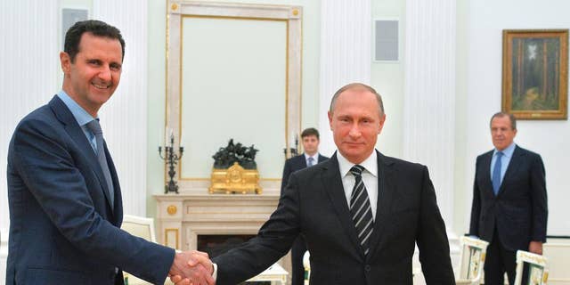 Russia's air campaign in Syria helped Syrian President Bashar al-Assad, left, regain control of his country during the Syrian civil war. At right is Russian President Vladimir Putin.