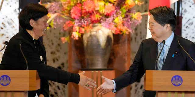 New Zealand Foreign Minister Nanaia Mahuta, left, and Japanese Foreign Minister Yoshimasa Hayashi, right, shake hands after their meeting at Iikura Guest House on Feb. 27, 2023, in Tokyo. 