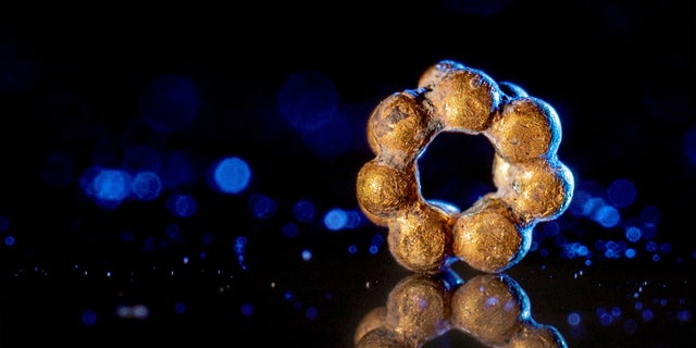 Rare gold bead found in the City of David on Feb. 8, 2023.
